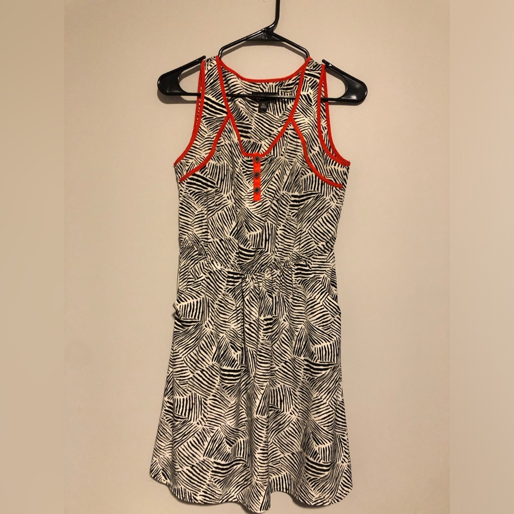 Black and White Patterned Dress with Red Accents